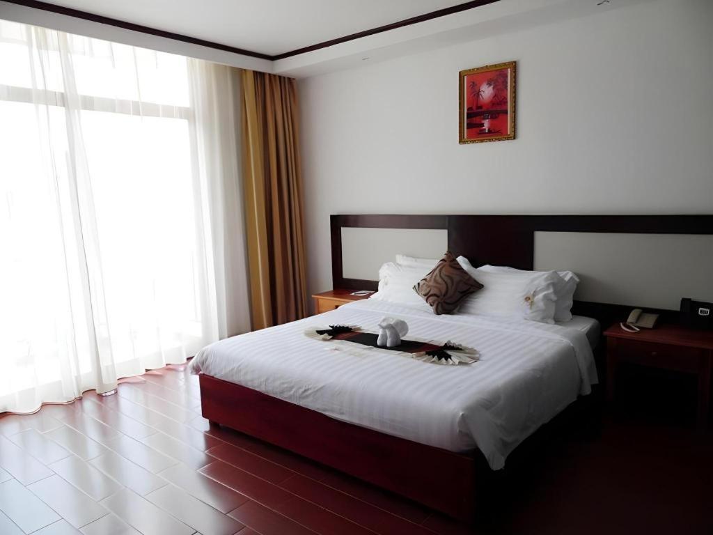 Xishuangbanna Hotel Managed By Xandria Hotel Luang Prabang Buitenkant foto